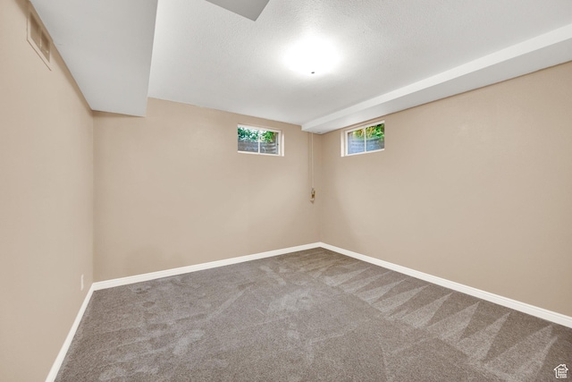 2864 N 175 E, Provo, UT 84604 - below grade area featuring carpet flooring, baseboards, and a textured ceiling