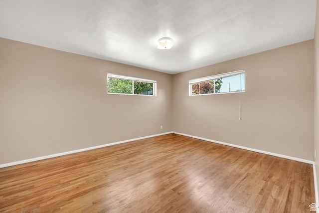 2864 N 175 E, Provo, UT 84604 - empty room featuring baseboards, plenty of natural light, and light wood-type flooring