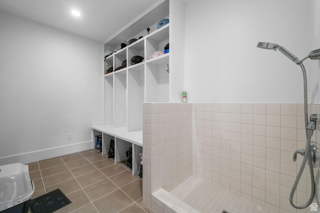 12277 S Emory Peak Cv Unit 404, Herriman, UT 84096 - mudroom with tile patterned floors and baseboards