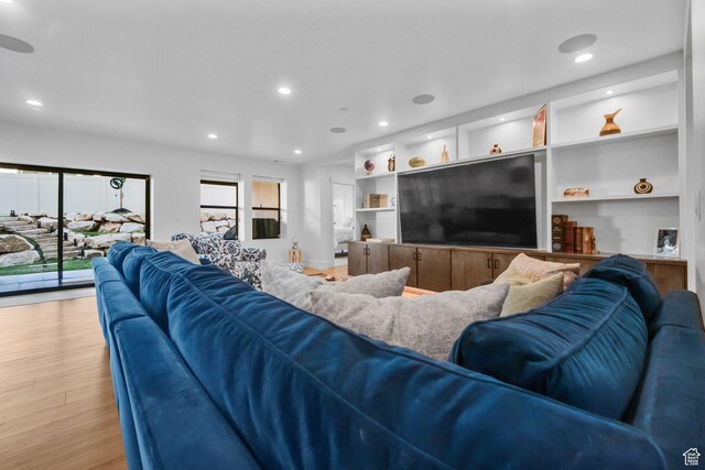 12277 S Emory Peak Cv Unit 404, Herriman, UT 84096 - living area featuring wood finished floors and recessed lighting