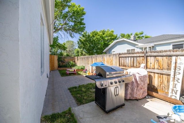 389 E 200 N, Spanish Fork, UT 84660 - fenced backyard featuring area for grilling and a patio