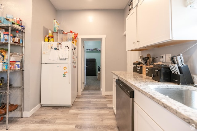 389 E 200 N, Spanish Fork, UT 84660 - kitchen featuring freestanding refrigerator, dishwasher, light wood-type flooring, white cabinets, and light stone counters