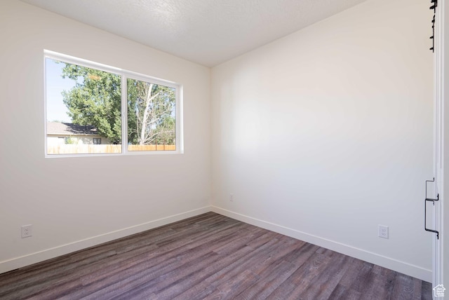 155 N 800 W, Vernal, UT 84078 - unfurnished room featuring dark wood finished floors and baseboards