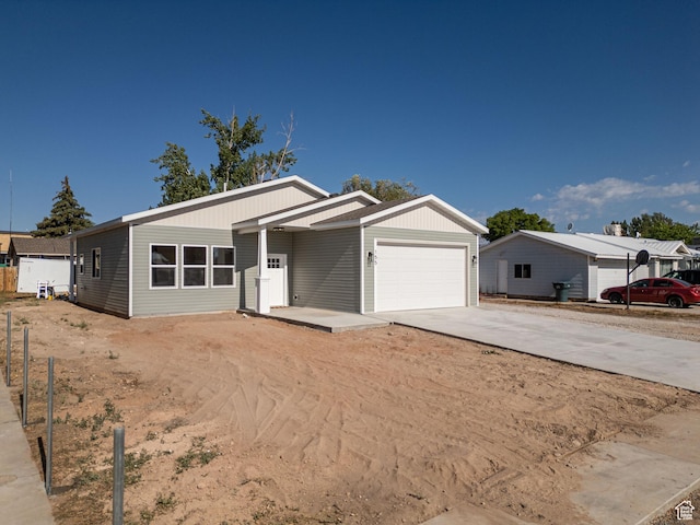 155 N 800 W, Vernal, UT 84078 - ranch-style home featuring concrete driveway and a garage