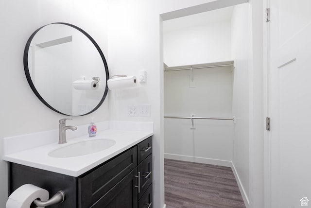 155 N 800 W, Vernal, UT 84078 - bathroom with vanity, wood finished floors, and a walk in closet
