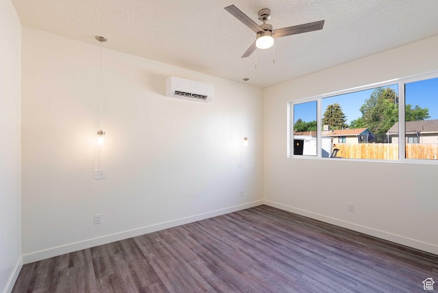 155 N 800 W, Vernal, UT 84078 - spare room featuring a wall mounted AC, wood finished floors, a ceiling fan, and a textured ceiling