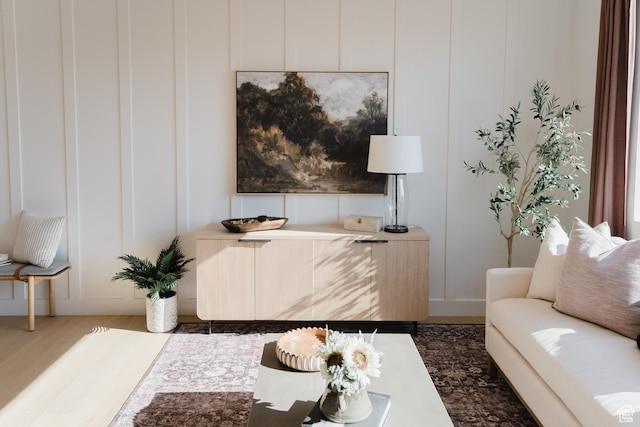 216 E 850 S Unit 6-203, Spanish Fork, UT 84660 - living area featuring a decorative wall and wood finished floors