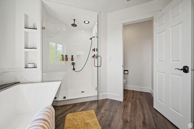 2951 N 1200 E, North Logan, UT 84341 - bathroom with a soaking tub, a marble finish shower, wood finished floors, baseboards, and toilet