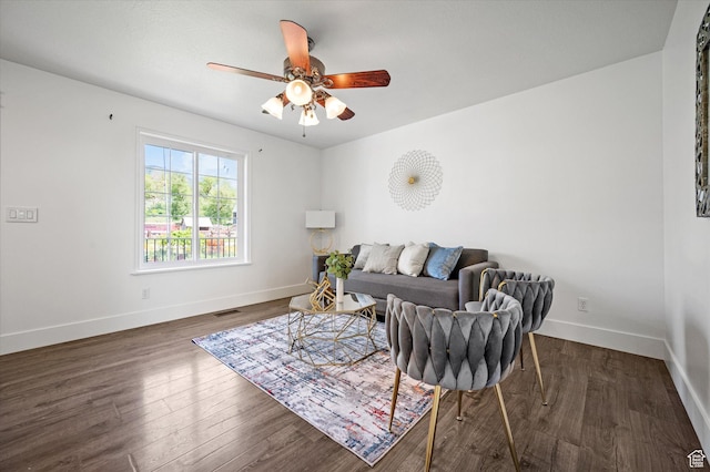 2951 N 1200 E, North Logan, UT 84341 - living room with wood finished floors, a ceiling fan, and baseboards
