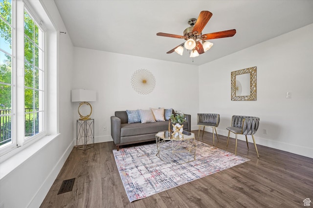 2951 N 1200 E, North Logan, UT 84341 - living area with baseboards, ceiling fan, and wood finished floors