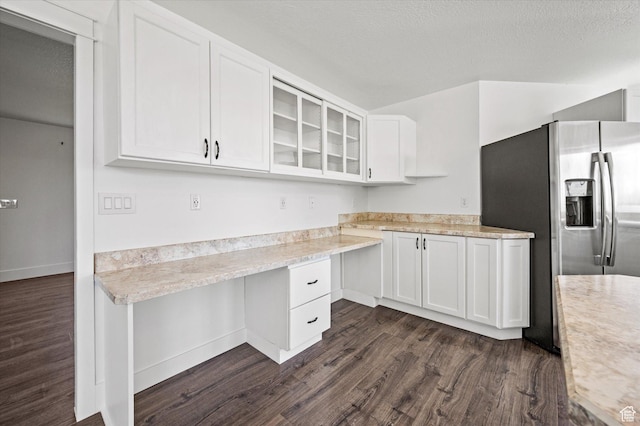 2951 N 1200 E, North Logan, UT 84341 - kitchen with stainless steel fridge, white cabinets, dark wood-type flooring, glass insert cabinets, and light countertops