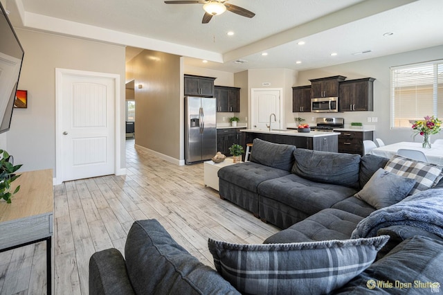 3482 W 150th St N, Hurricane, UT 84737 - living area with ceiling fan, recessed lighting, light wood-type flooring, and baseboards