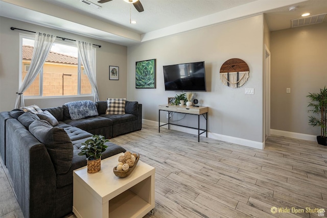 3482 W 150th St N, Hurricane, UT 84737 - living area featuring a ceiling fan, light wood-style floors, baseboards, recessed lighting, and a tray ceiling