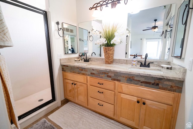 1825 W Mathis Park Pl Unit 13, St George, UT 84770 - bathroom with a shower stall, double vanity, and ceiling fan