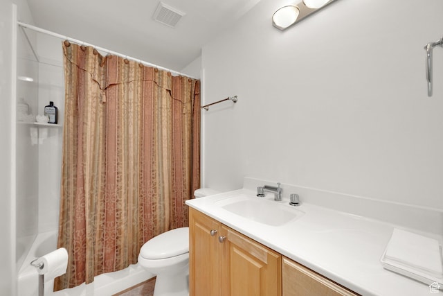 2967 E Branch Dr S, Holladay, UT 84117 - bathroom featuring toilet, shower / bath combo with shower curtain, and vanity