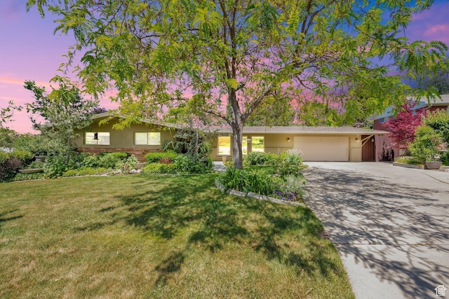 2967 E Branch Dr S, Holladay, UT 84117 - view of front of home with driveway, a garage, a front lawn, and stucco siding