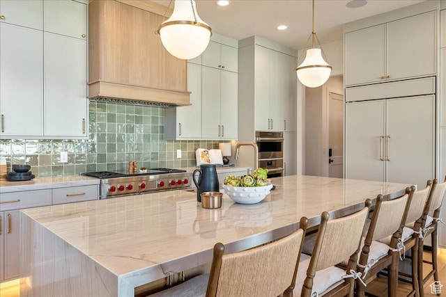 812 N 780 W, American Fork, UT 84003 - kitchen with light stone counters, tasteful backsplash, a center island with sink, appliances with stainless steel finishes, and recessed lighting