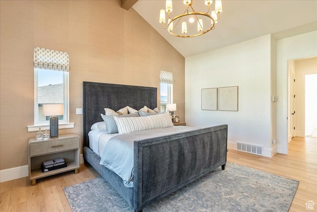 812 N 780 W, American Fork, UT 84003 - bedroom featuring baseboards, a chandelier, light wood-style floors, and high vaulted ceiling