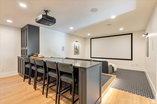 812 N 780 W, American Fork, UT 84003 - cinema room featuring a dry bar, baseboards, light wood-style floors, and recessed lighting