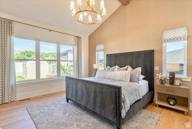 812 N 780 W, American Fork, UT 84003 - bedroom featuring wood-type flooring, a chandelier, high vaulted ceiling, and baseboards
