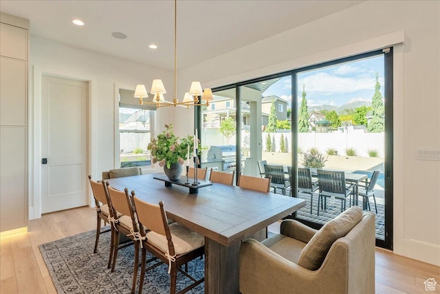 812 N 780 W, American Fork, UT 84003 - dining area featuring light wood finished floors, a chandelier, plenty of natural light, and recessed lighting