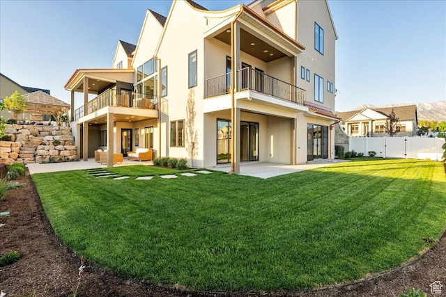 807 N 780 W, American Fork, UT 84003 - back of property featuring a balcony, stucco siding, a patio area, and an outdoor living space