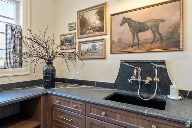 807 N 780 W, American Fork, UT 84003 - detailed view of a sink and dark brown cabinets