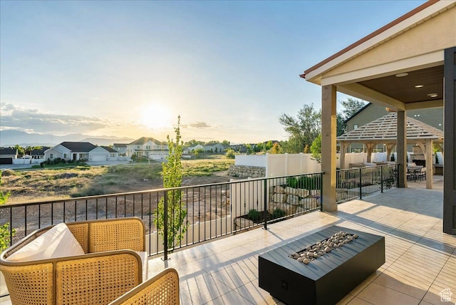 807 N 780 W, American Fork, UT 84003 - deck with an outdoor living space with a fire pit, a patio area, and a gazebo