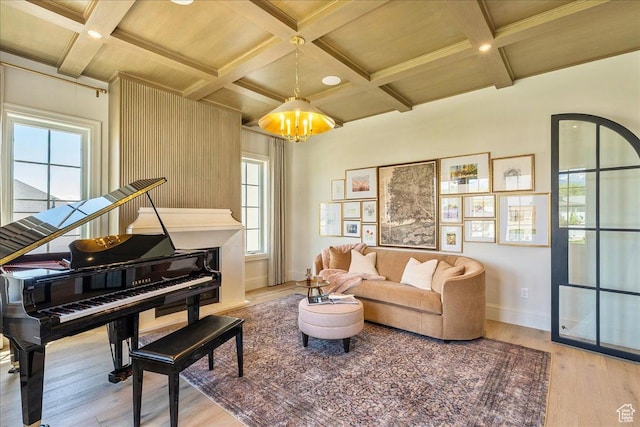 807 N 780 W, American Fork, UT 84003 - living area featuring coffered ceiling, wood finished floors, baseboards, a chandelier, and healthy amount of natural light