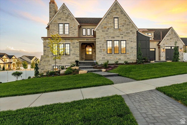 807 N 780 W, American Fork, UT 84003 - view of front of home featuring stone siding, stucco siding, and a chimney