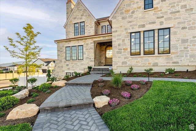 807 N 780 W, American Fork, UT 84003 - view of front facade featuring stone siding and a chimney