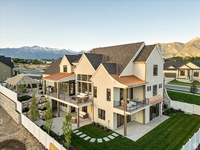 807 N 780 W, American Fork, UT 84003 - back of house with stucco siding, a mountain view, a patio, and a balcony