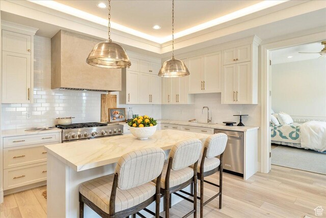 807 N 780 W, American Fork, UT 84003 - kitchen featuring dishwasher, light countertops, light wood-style flooring, backsplash, and recessed lighting