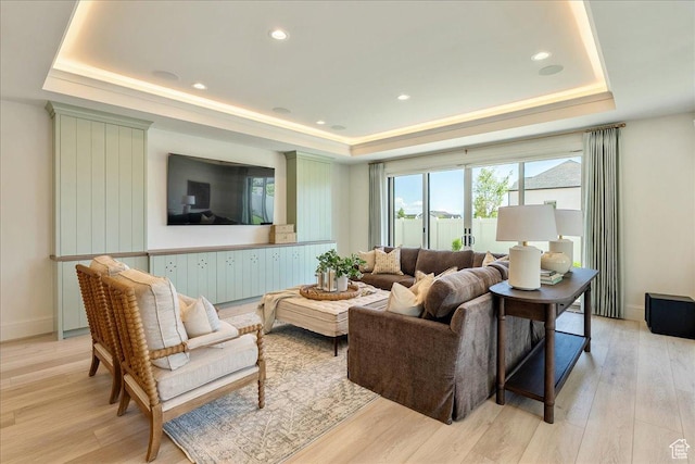 807 N 780 W, American Fork, UT 84003 - living room featuring a tray ceiling, light wood-style floors, baseboards, and recessed lighting
