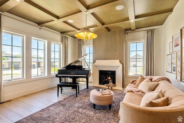 807 N 780 W, American Fork, UT 84003 - living area with wood-type flooring, a chandelier, baseboards, beam ceiling, and coffered ceiling
