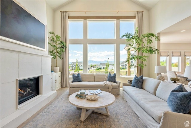 807 N 780 W, American Fork, UT 84003 - living room featuring high vaulted ceiling and a fireplace