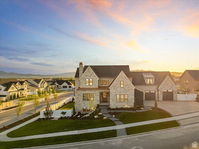 807 N 780 W, American Fork, UT 84003 - french country inspired facade with stone siding, concrete driveway, and a residential view