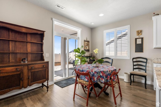 1165 W Silver Hollow Rd, Syracuse, UT 84075 - dining area featuring wood finished floors, baseboards, and recessed lighting