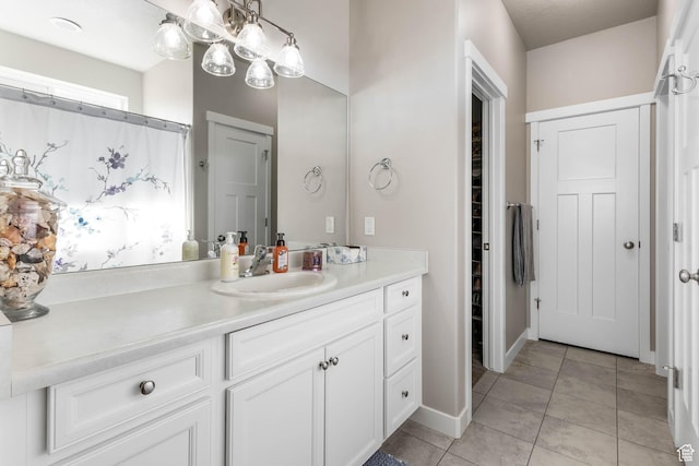 1165 W Silver Hollow Rd, Syracuse, UT 84075 - full bathroom featuring vanity, tile patterned flooring, and a closet