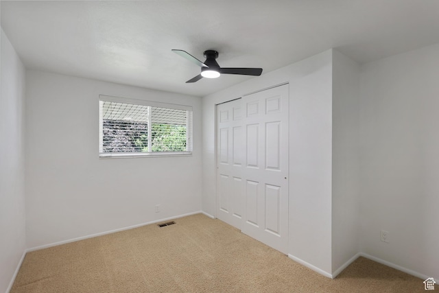 533 N 700 E, Orem, UT 84097 - unfurnished bedroom with light colored carpet, a closet, baseboards, and ceiling fan