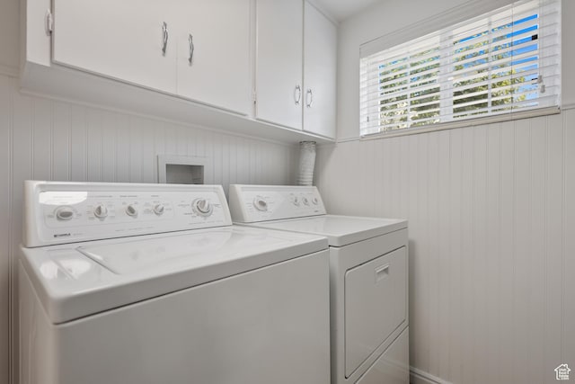 533 N 700 E, Orem, UT 84097 - laundry room featuring cabinet space, separate washer and dryer, and wood walls