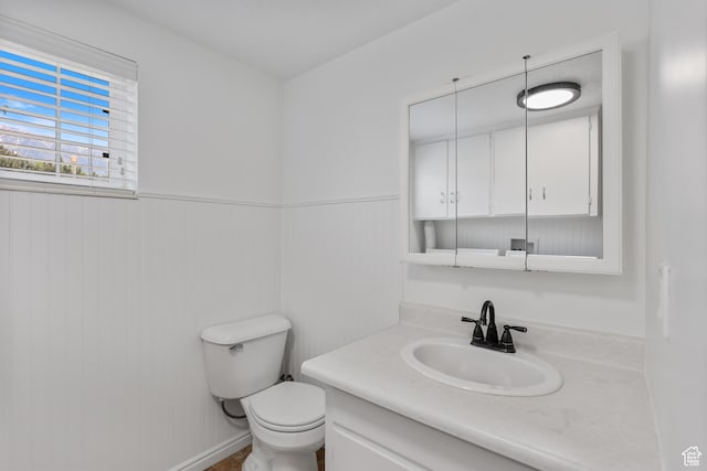 533 N 700 E, Orem, UT 84097 - bathroom with vanity, toilet, and wainscoting