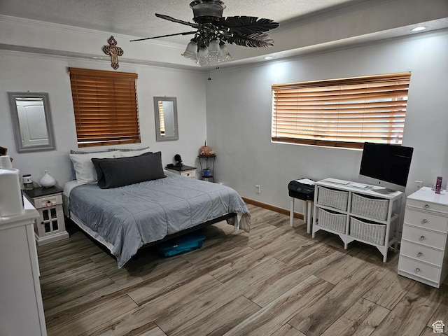 920 N 100 E, Pleasant Grove, UT 84062 - bedroom with wood finished floors, ornamental molding, a ceiling fan, a textured ceiling, and baseboards