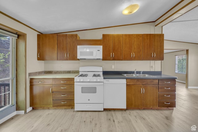 454 E 100 N, Moab, UT 84532 - kitchen with white appliances, vaulted ceiling, a sink, light wood-style floors, and crown molding