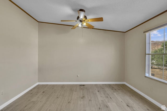 454 E 100 N, Moab, UT 84532 - unfurnished room featuring ornamental molding, wood finished floors, ceiling fan, baseboards, and a textured ceiling