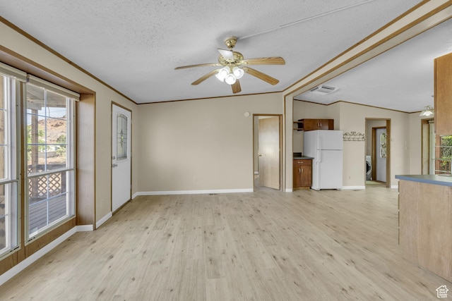 454 E 100 N, Moab, UT 84532 - unfurnished living room with light wood finished floors, a ceiling fan, baseboards, crown molding, and a textured ceiling