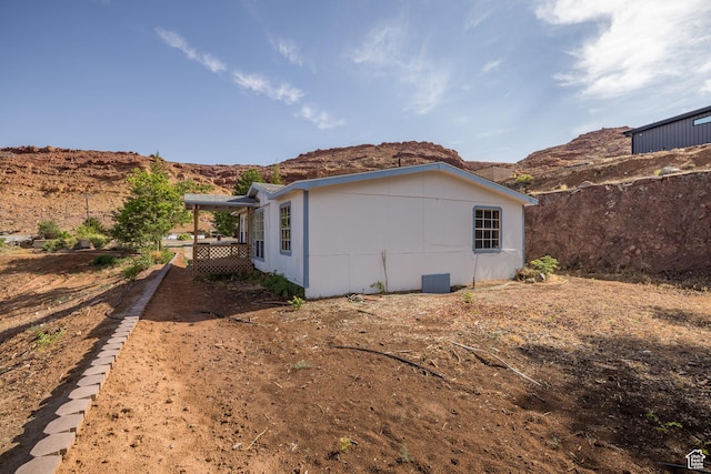 454 E 100 N, Moab, UT 84532 - view of home's exterior with a mountain view