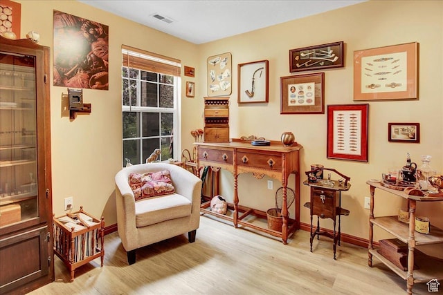 1422 N Fowler Ave E, Ogden, UT 84404 - living area featuring light wood-style flooring and baseboards