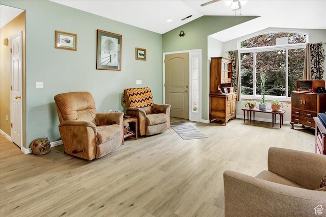 1422 N Fowler Ave E, Ogden, UT 84404 - living room with ceiling fan, light wood-type flooring, vaulted ceiling, and baseboards