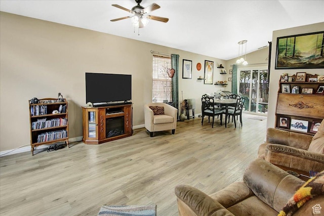 1422 N Fowler Ave E, Ogden, UT 84404 - living area with ceiling fan, wood finished floors, vaulted ceiling, and baseboards